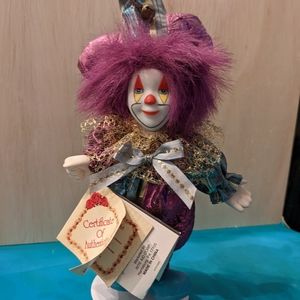 Collector's choice bisque porcelain clown.  Multicolor.